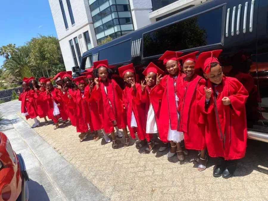 Graduating pupils in caps and gowns